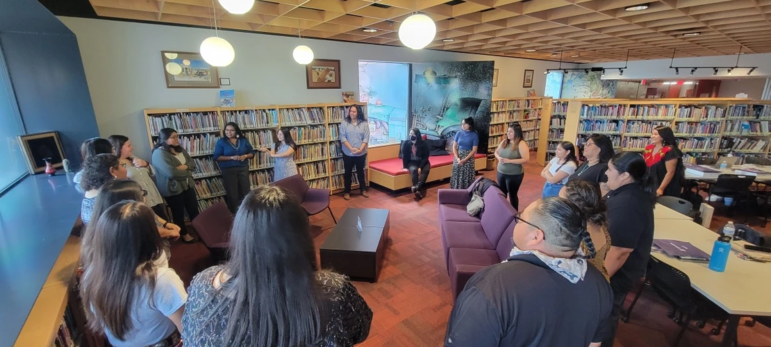 teacher and group of students in a circle